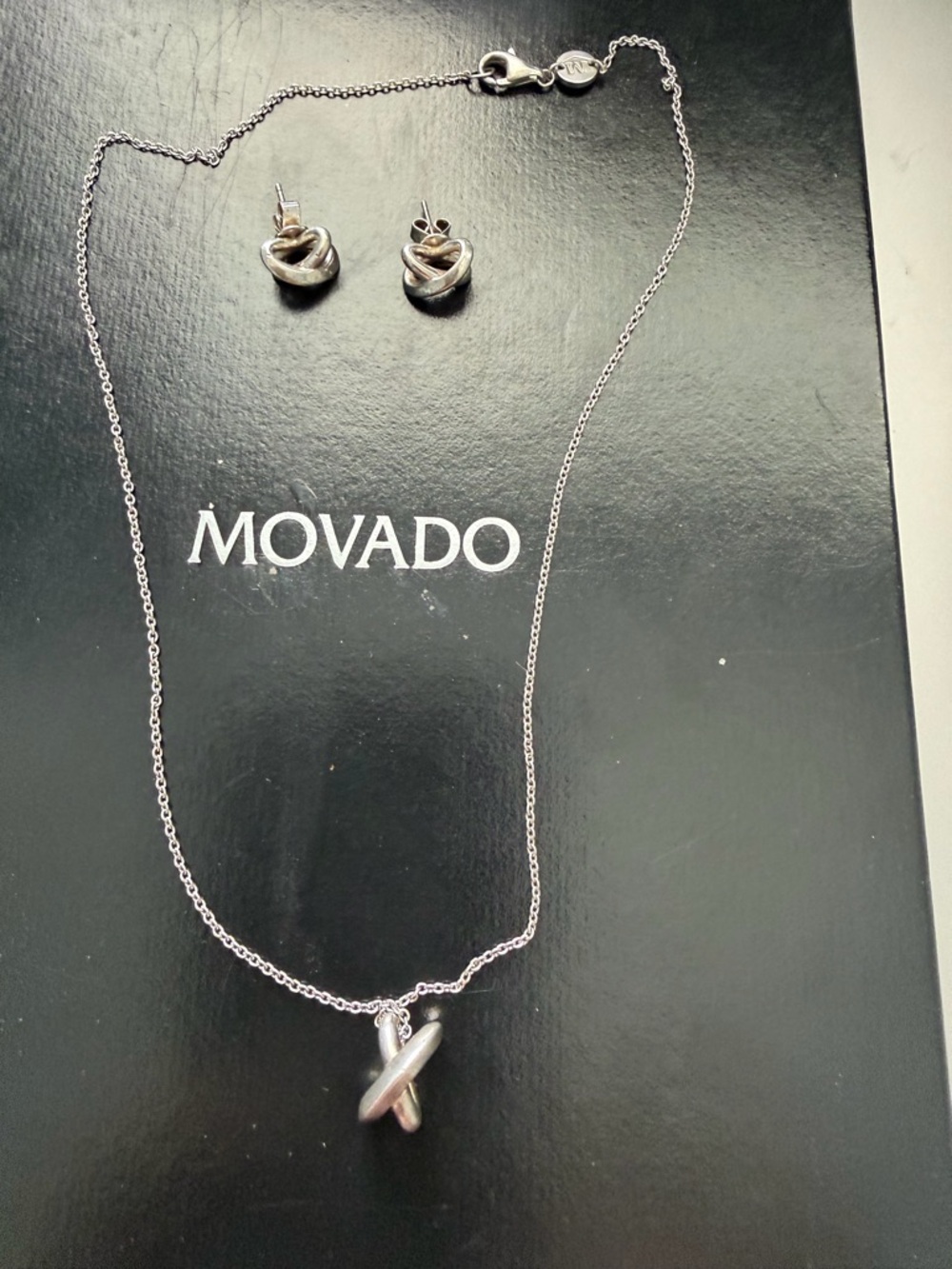 Movado Silver Knot Pendant Necklace with Matching Stud Earrings